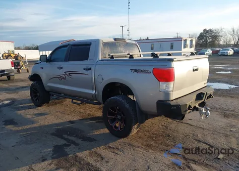 2010 Toyota Tundra Limited 5.7L V8 z USA, uszkodzony, nr VIN 5TFHW5F14AX130936